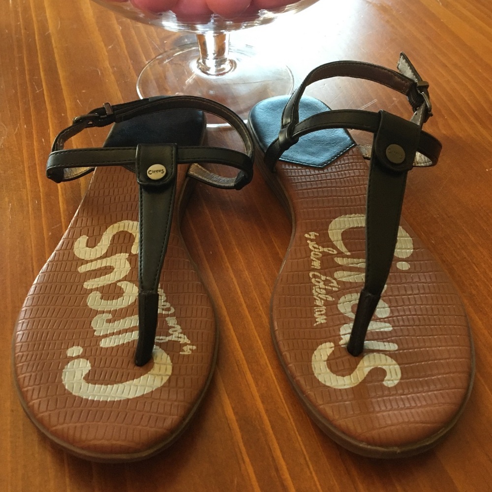 Black sandals.